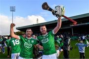 24 October 2021; Kilmallock players Kevin O'Donnell, left, and Enda Enright celebrate after their side's victory in the Limerick County Senior Club Hurling Championship Final match between Kilmallock and Patrickswell at TUS Gaelic Grounds in Limerick. Photo by Piaras Ó Mídheach/Sportsfile