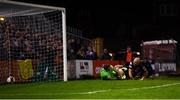 22 October 2021; Georgie Kelly of Bohemians scores his side's goal past Waterford goalkeeper Brian Murphy during the Extra.ie FAI Cup Semi-Final match between Bohemians and Waterford at Dalymount Park in Dublin. Photo by Stephen McCarthy/Sportsfile