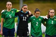 23 October 2021; Northern Ireland players, from left, Fionnuala Morgan, Rachael Norney, Sarah Jane Mcmaster and Ella Haughey during the UEFA Women's U19 Championship Qualifier match between England and Northern Ireland at Jackman Park in Limerick. Photo by Eóin Noonan/Sportsfile