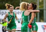 24 October 2021; Anna O'Flanagan of Ireland celebrates with team-mate Michelle Carey after scoring her side's first goal during the FIH Women's World Cup European Qualifier Final match between Ireland and Wales at Pisa in Italy. Photo by Roberto Bregani/Sportsfile