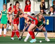 24 October 2021; Sarah Hawkshaw of Ireland in action against Phoebe Richards of Wales during the FIH Women's World Cup European Qualifier Final match between Ireland and Wales at Pisa in Italy. Photo by Roberto Bregani/Sportsfile