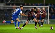 25 October 2021; Dawson Devoy of Bohemians is fouled by Jack Stafford of Waterford during the SSE Airtricity League Premier Division match between Bohemians and Waterford at Dalymount Park in Dublin. Photo by Seb Daly/Sportsfile
