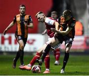 25 October 2021; Jamie Lennon of St Patrick's Athletic is tackled by Daniel Kelly of Dundalk during the SSE Airtricity League Premier Division match between St Patrick's Athletic and Dundalk at Richmond Park in Dublin. Photo by Ben McShane/Sportsfile