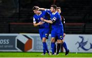 25 October 2021; John Martin of Waterford, left, celebrates with team-mate Eddie Nolan after scoring their side's first goal during the SSE Airtricity League Premier Division match between Bohemians and Waterford at Dalymount Park in Dublin. Photo by Seb Daly/Sportsfile