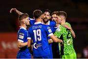 25 October 2021; Anthony Wordsworth of Waterford, centre, celebrates with team-mates, from left, Cameron Evans, Jack Stafford, John Martin and goalkeeper Paul Martin after their side's victory in the SSE Airtricity League Premier Division match between Bohemians and Waterford at Dalymount Park in Dublin. Photo by Seb Daly/Sportsfile