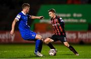 25 October 2021; Tyreke Wilson of Bohemians in action against John Martin of Waterford during the SSE Airtricity League Premier Division match between Bohemians and Waterford at Dalymount Park in Dublin. Photo by Seb Daly/Sportsfile