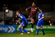 25 October 2021; Promise Omochere of Bohemians in action against Darragh Power of Waterford during the SSE Airtricity League Premier Division match between Bohemians and Waterford at Dalymount Park in Dublin. Photo by Seb Daly/Sportsfile