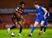 25 October 2021; Promise Omochere of Bohemians in action against Jack Stafford of Waterford during the SSE Airtricity League Premier Division match between Bohemians and Waterford at Dalymount Park in Dublin. Photo by Seb Daly/Sportsfile