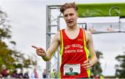 17 October 2021; Nicholas Griggs of Mid Ulster AC, Derry, celebrates winning the Junior Men's 6000m  during the Autumn Open International Cross Country at the Sport Ireland Campus in Dublin. Photo by Sam Barnes/Sportsfile