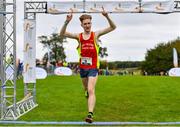17 October 2021; Nicholas Griggs of Mid Ulster AC, Derry, celebrates winning the Junior Men's 6000m  during the Autumn Open International Cross Country at the Sport Ireland Campus in Dublin. Photo by Sam Barnes/Sportsfile
