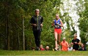 17 October 2021; Jodie McCann of Dublin City Harriers AC, warms down with her coach Enda Fitzpatrick during the Autumn Open International Cross Country at the Sport Ireland Campus in Dublin. Photo by Sam Barnes/Sportsfile