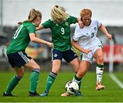 26 October 2021; Shauna Brennan of Republic of Ireland is tackled by Cora Chambers of Northern Ireland during the UEFA Women's U19 Championship Qualifier Group 5 Qualifying Round 1 League A match between Northern Ireland and Republic of Ireland at Jackman Park in Markets Field, Limerick. Photo by Eóin Noonan/Sportsfile