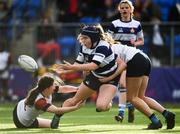 26 October 2021; Amy Lynch of North Midlands is tackled by Siobhan Egan, left, and Georgia Young of Midlands during the Sarah Robinson Cup First Round match between North Midlands and Midlands at Energia Park in Dublin. Photo by David Fitzgerald/Sportsfile