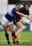 26 October 2021; Grace Adams of Metro is tackled by Robyn O'Connor of South East during the Sarah Robinson Cup First Round match between South East and Metro at Energia Park in Dublin. Photo by David Fitzgerald/Sportsfile