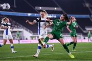 26 October 2021; Lucy Quinn of Republic of Ireland in action against Emmi Alanen of Finland during the FIFA Women's World Cup 2023 qualifying group A match between Finland and Republic of Ireland at Helsinki Olympic Stadium in Helsinki, Finland. Photo by Stephen McCarthy/Sportsfile