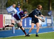 26 October 2021; Robyn Hyland of Metro is tackled by Jane Neill of South East during the Sarah Robinson Cup First Round match between South East and Metro at Energia Park in Dublin. Photo by David Fitzgerald/Sportsfile