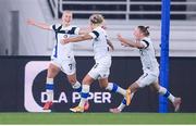 26 October 2021; Adelina Engman of Finland celebrates with team-mates Emma Koivisto, centre, and Sanni Franssi after scoring her side's first goal during the FIFA Women's World Cup 2023 qualifying group A match between Finland and Republic of Ireland at Helsinki Olympic Stadium in Helsinki, Finland. Photo by Stephen McCarthy/Sportsfile