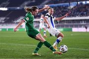 26 October 2021; Heather Payne of Republic of Ireland in action against Emma Koivisto of Finland during the FIFA Women's World Cup 2023 qualifying group A match between Finland and Republic of Ireland at Helsinki Olympic Stadium in Helsinki, Finland. Photo by Stephen McCarthy/Sportsfile