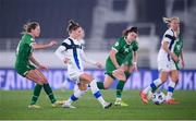 26 October 2021; Natalia Kuikka of Finland in action against Heather Payne, left, and Lucy Quinn of Republic of Ireland during the FIFA Women's World Cup 2023 qualifying group A match between Finland and Republic of Ireland at Helsinki Olympic Stadium in Helsinki, Finland. Photo by Stephen McCarthy/Sportsfile