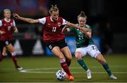 26 October 2021; Virginia Kirchberger of Austria in action against Kerry Beattie of Northern Ireland during the FIFA Women's World Cup 2023 qualifying group D match between Northern Ireland and Austria at Seaview in Belfast. Photo by Ramsey Cardy/Sportsfile