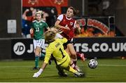26 October 2021; Barbara Dunst of Austria in action against Northern Ireland goalkeeper Jacqueline Burns during the FIFA Women's World Cup 2023 qualifying group D match between Northern Ireland and Austria at Seaview in Belfast. Photo by Ramsey Cardy/Sportsfile