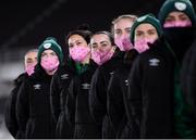 26 October 2021; Republic of Ireland players, including Roma McLaughlin and Eve Badana stand for the playing of the National Anthem before the FIFA Women's World Cup 2023 qualifying group A match between Finland and Republic of Ireland at Helsinki Olympic Stadium in Helsinki, Finland. Photo by Stephen McCarthy/Sportsfile