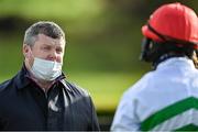 29 October 2021; Trainer Gordon Elliott, in conversation with jockey Jack Kennedy, before sending out Zanahiyr to win the WKD Hurdle on day one of the Ladbrokes Festival of Racing at Down Royal in Lisburn, Down. Photo by Ramsey Cardy/Sportsfile