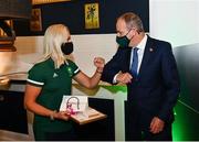 29 October 2021; The athletes and staff who represented Team Ireland at Tokyo 2020 this summer were formally congratulated at the Official Team Ireland Homecoming in Dublin Castle. A record number of Irish athletes competed at the Summer Olympics in Japan with 116 athletes competing across nineteen sports. An Taoiseach Michéal Martin TD, Minister Catherine Martin TD, Minister of State Jack Chambers TD and His Excellency Ambassador Extraordinary and Plenipotentiary of Japan to Ireland, Mr Mitsuru Kitano attended the event to honour the athletes. Pictured is An Taoiseach Micheál Martin TD with Team Ireland Olympian Sarah Lavin. Photo by Sam Barnes/Sportsfile