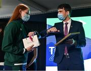 29 October 2021; The athletes and staff who represented Team Ireland at Tokyo 2020 this summer were formally congratulated at the Official Team Ireland Homecoming in Dublin Castle. A record number of Irish athletes competed at the Summer Olympics in Japan with 116 athletes competing across nineteen sports. An Taoiseach Michéal Martin TD, Minister Catherine Martin TD, Minister of State Jack Chambers TD and His Excellency Ambassador Extraordinary and Plenipotentiary of Japan to Ireland, Mr Mitsuru Kitano attended the event to honour the athletes. Making a presentation to Team Ireland athlete Danielle Hill is Minister of State for Sport, the Gaeltacht & Defence, Jack Chambers TD.  Photo by Brendan Moran/Sportsfile