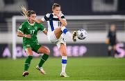 26 October 2021; Emmi Alanen of Finland in action against Jamie Finn of Republic of Ireland during the FIFA Women's World Cup 2023 qualifying group A match between Finland and Republic of Ireland at Helsinki Olympic Stadium in Helsinki, Finland. Photo by Stephen McCarthy/Sportsfile