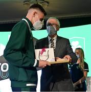 29 October 2021; The athletes and staff who represented Team Ireland at Tokyo 2020 this summer were formally congratulated at the Official Team Ireland Homecoming in Dublin Castle. A record number of Irish athletes competed at the Summer Olympics in Japan with 116 athletes competing across nineteen sports. An Taoiseach Michéal Martin TD, Minister Catherine Martin TD, Minister of State Jack Chambers TD and His Excellency Ambassador Extraordinary and Plenipotentiary of Japan to Ireland, Mr Mitsuru Kitano attended the event to honour the athletes. Making a presentation to Team Ireland athlete Jack Woolley is Sport Ireland chief executive John Treacy.  Photo by Brendan Moran/Sportsfile