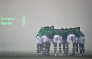 29 October 2021; The Shamrock Rovers team huddle together amid heavy smoke from flares in the stadium before the SSE Airtricity League Premier Division match between Shamrock Rovers and Finn Harps at Tallaght Stadium in Dublin. Photo by Eóin Noonan/Sportsfile