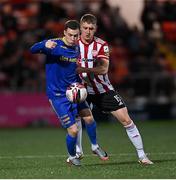 29 October 2021; Liam Burt of Bohemians in action against Ronan Boyce of Derry City during the SSE Airtricity League Premier Division match between Derry City and Bohemians at Ryan McBride Brandywell Stadium in Derry. Photo by Ramsey Cardy/Sportsfile