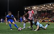 29 October 2021; James Akintunde of Derry City is tackled by Bohemians goalkeeper James Talbot, supported by Anto Breslin, during the SSE Airtricity League Premier Division match between Derry City and Bohemians at Ryan McBride Brandywell Stadium in Derry. Photo by Ramsey Cardy/Sportsfile