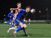 29 October 2021; Rory Feely of Bohemians in action against Jamie Mcgonigle of Derry City during the SSE Airtricity League Premier Division match between Derry City and Bohemians at Ryan McBride Brandywell Stadium in Derry. Photo by Ramsey Cardy/Sportsfile