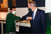 29 October 2021; The athletes and staff who represented Team Ireland at Tokyo 2020 this summer were formally congratulated at the Official Team Ireland Homecoming in Dublin Castle. A record number of Irish athletes competed at the Summer Olympics in Japan with 116 athletes competing across nineteen sports. An Taoiseach Michéal Martin TD, Minister Catherine Martin TD, Minister of State Jack Chambers TD and His Excellency Ambassador Extraordinary and Plenipotentiary of Japan to Ireland, Mr Mitsuru Kitano attended the event to honour the athletes. Pictured is An Taoiseach Micheál Martin TD with Team Ireland support staff member Sean Dancer. Photo by Sam Barnes/Sportsfile