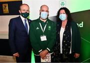 29 October 2021; The athletes and staff who represented Team Ireland at Tokyo 2020 this summer were formally congratulated at the Official Team Ireland Homecoming in Dublin Castle. A record number of Irish athletes competed at the Summer Olympics in Japan with 116 athletes competing across nineteen sports. An Taoiseach Michéal Martin TD, Minister Catherine Martin TD, Minister of State Jack Chambers TD and His Excellency Ambassador Extraordinary and Plenipotentiary of Japan to Ireland, Mr Mitsuru Kitano attended the event to honour the athletes. Pictured is An Taoiseach Micheál Martin TD with Team Ireland Tokyo 2020 Chef de Mission Patricia Heberle and Team Ireland support staff member Paul Carragher. Photo by Sam Barnes/Sportsfile