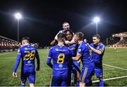 29 October 2021; Promise Omochere, centre, of Bohemians celebrates with teammates after scoring his side's first goal during the SSE Airtricity League Premier Division match between Derry City and Bohemians at Ryan McBride Brandywell Stadium in Derry. Photo by Ramsey Cardy/Sportsfile