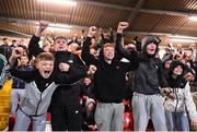 29 October 2021; Derry City supporters celebrate their side's first goal during the SSE Airtricity League Premier Division match between Derry City and Bohemians at Ryan McBride Brandywell Stadium in Derry. Photo by Ramsey Cardy/Sportsfile