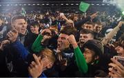 29 October 2021; Danny Mandroiu of Shamrock Rovers, centre, celebrates with supporters after the SSE Airtricity League Premier Division match between Shamrock Rovers and Finn Harps at Tallaght Stadium in Dublin. Photo by Eóin Noonan/Sportsfile