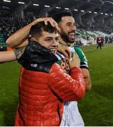 29 October 2021; Roberto Lopes of Shamrock Rovers, centre, celebrates with a supporter after the SSE Airtricity League Premier Division match between Shamrock Rovers and Finn Harps at Tallaght Stadium in Dublin. Photo by Eóin Noonan/Sportsfile