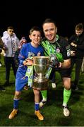 29 October 2021; Shelbourne goalkeeper Brendan Clarke and his son, Zac, aged 9, celebrate with the SSE Airtricity League First Division Trophy after the SSE Airtricity League First Division match between Shelbourne and UCD at Tolka Park in Dublin. Photo by Seb Daly/Sportsfile