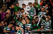 29 October 2021; Graham Burke of Shamrock Rovers, centre, celebrates with team-mates and supporters after the SSE Airtricity League Premier Division match between Shamrock Rovers and Finn Harps at Tallaght Stadium in Dublin. Photo by Eóin Noonan/Sportsfile