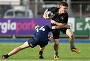 28 October 2021; Mark Cleary of Metro is tackled by PJ Larkin of North Midlands during the Shane Horgan Cup Third Round match between Metro and North Midlands at Energia Park in Dublin. Photo by Brendan Moran/Sportsfile
