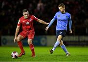 29 October 2021; Paul Doyle of UCD in action against Georgie Poynton of Shelbourne during the SSE Airtricity League First Division match between Shelbourne and UCD at Tolka Park in Dublin. Photo by Seb Daly/Sportsfile