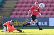30 October 2021; Richard McAvoy of Willowbank looks on after shooting to score his side's first goal, alongside Fairview Rangers goalkeeper Aaron Savage, during the President's junior cup final match between Fairview Rangers and Willowbank FC at Tallaght Stadium in Dublin. Photo by Piaras Ó Mídheach/Sportsfile