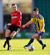 30 October 2021; Michael Savage of Willowbank FC in action against Russell Ouirke of Fairview Rangers during the President's junior cup final match between Fairview Rangers and Willowbank FC at Tallaght Stadium in Dublin. Photo by Piaras Ó Mídheach/Sportsfile