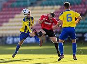30 October 2021; Pearse Devine of Willowbank FC in action against Jeffrey Judge of Fairview Rangers during the President's junior cup final match between Fairview Rangers and Willowbank FC at Tallaght Stadium in Dublin. Photo by Piaras Ó Mídheach/Sportsfile