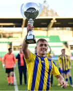 30 October 2021; Fairview Rangers captain AJ O'Connor lifts the cup after the President's junior cup final match between Fairview Rangers and Willowbank FC at Tallaght Stadium in Dublin. Photo by Piaras Ó Mídheach/Sportsfile