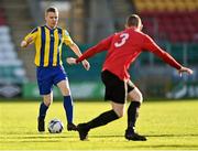 30 October 2021; Mark Slattery of Fairview Rangers in action against Gary Mason of Willowbank FC during the President's junior cup final match between Fairview Rangers and Willowbank FC at Tallaght Stadium in Dublin. Photo by Piaras Ó Mídheach/Sportsfile